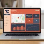 Close-up of a laptop on a clean office desk displaying the TechniqCo Google Business Profile optimization dashboard with local search analytics, review metrics, and map pack ranking data in coral-orange and dark navy brand colours.